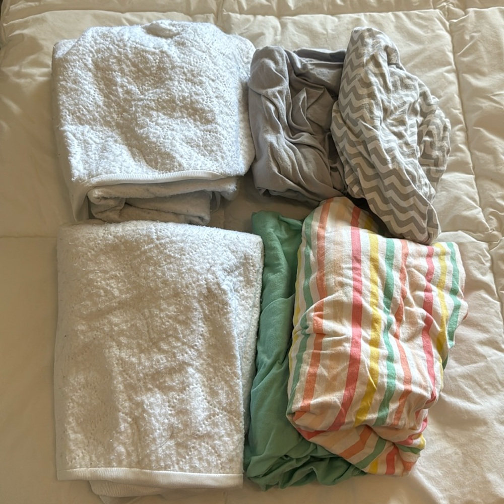 Lot of mattress covers and sheets for Graco sized pack n play